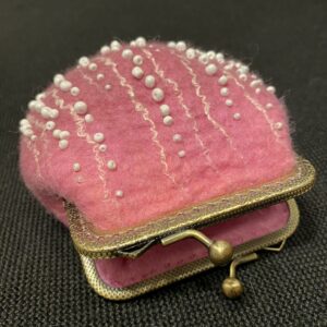 Pink purse with white beads